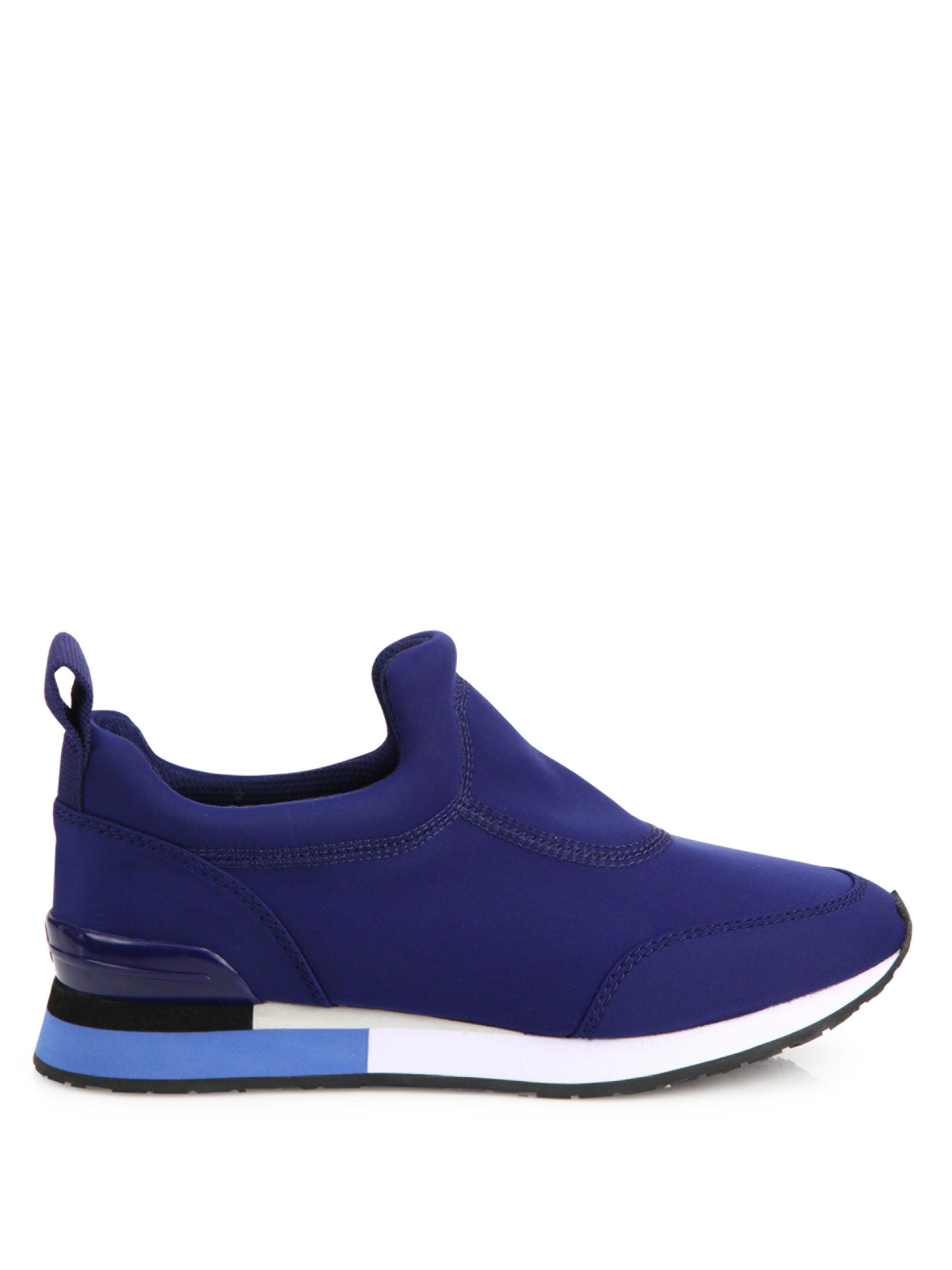 tory burch navy sneakers